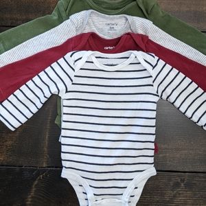 3mo Set of Carter's 4 long sleeve onesies.